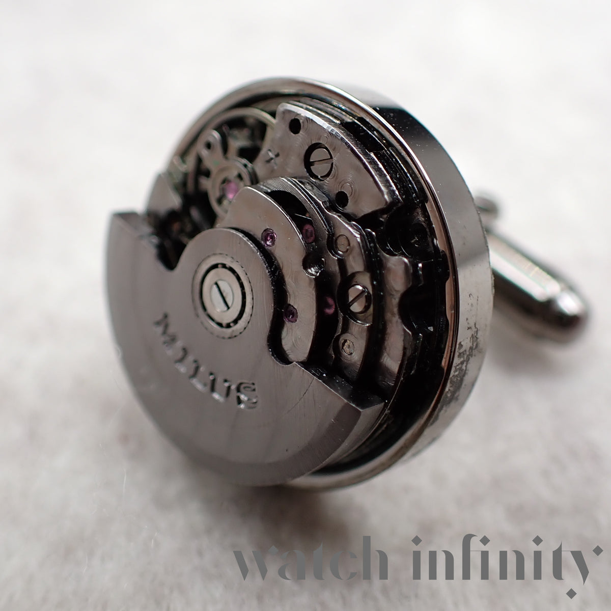 Milus, pair of cufflinks