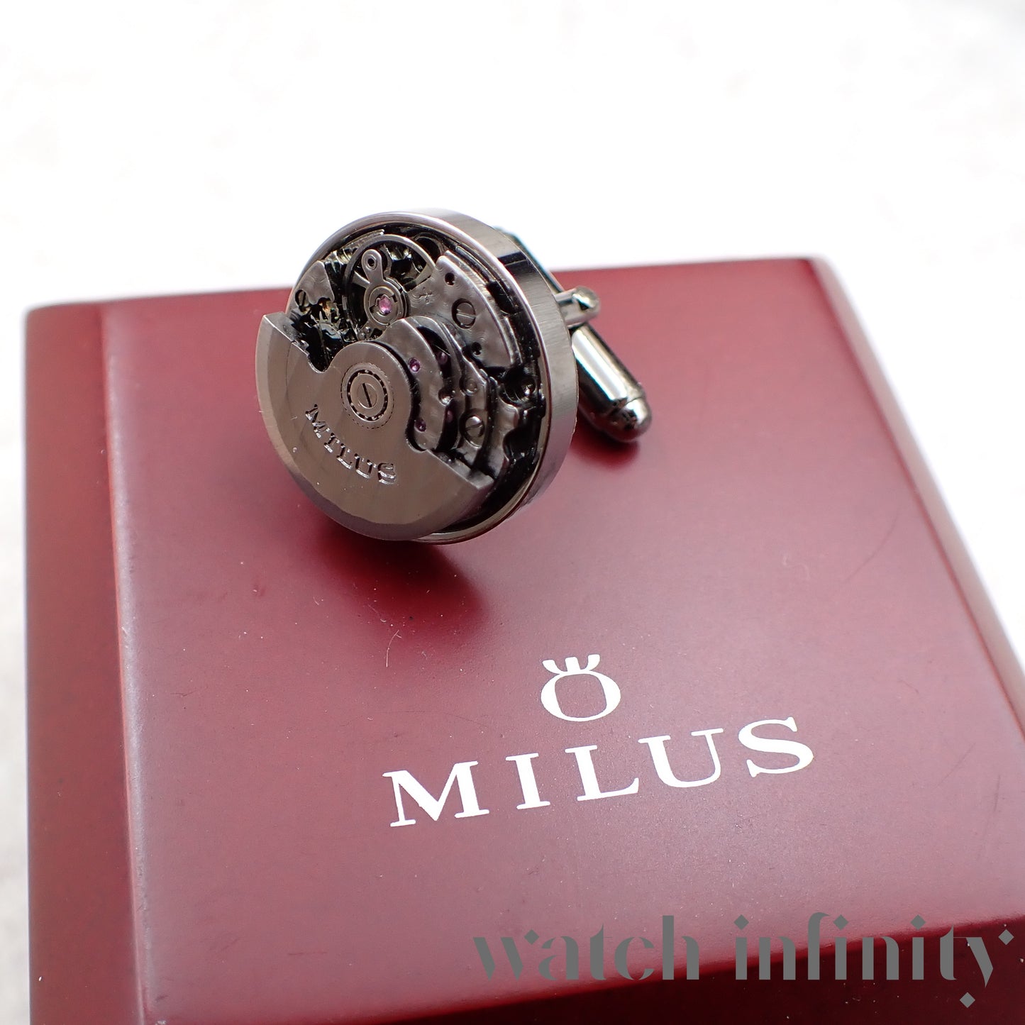 Milus, paire de boutons de manchette