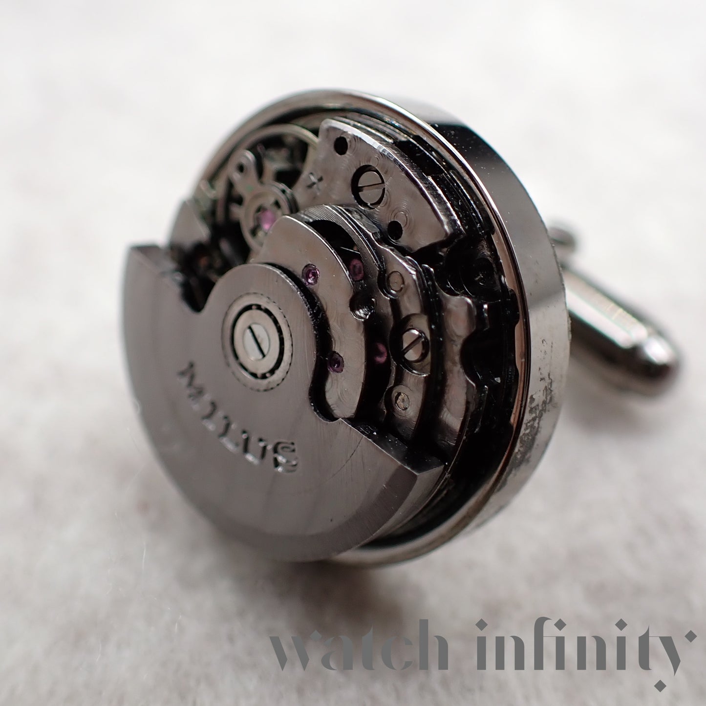 Milus, paire de boutons de manchette