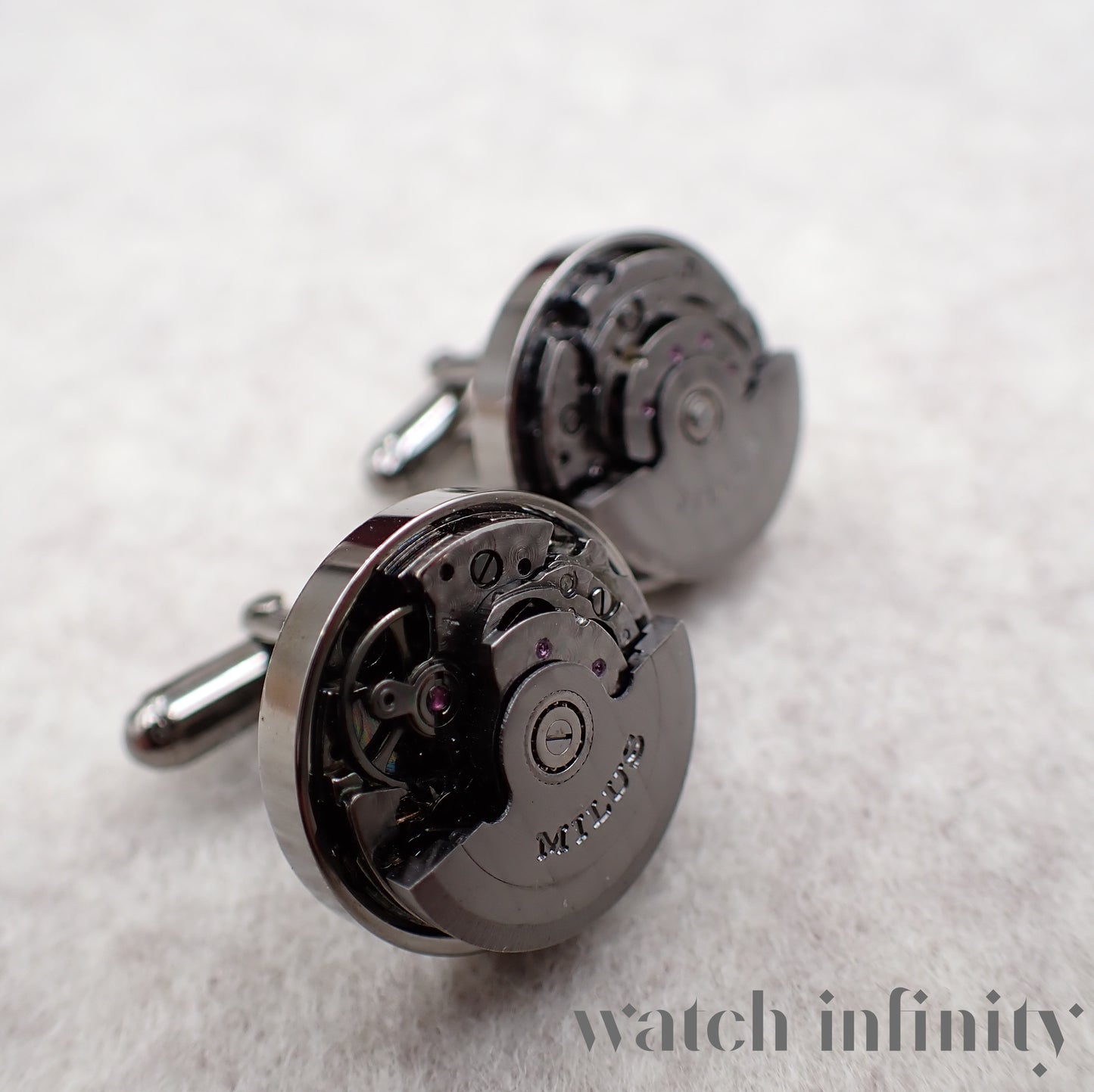 Milus, paire de boutons de manchette